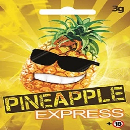 Pineapple Express Herbal Incense stick burning in a serene room, filling the space with a refreshing tropical aroma